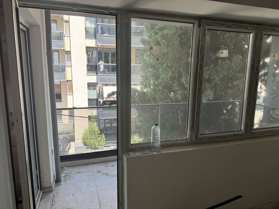 Apartament në një ndërtesë të re në Qendër - 1